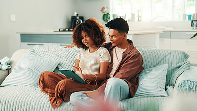 Buy stock photo Tablet, happy and couple in living room in home with planning romantic vacation, holiday or getaway. Relax, digital technology and man with woman for booking flights for honeymoon trip in apartment.