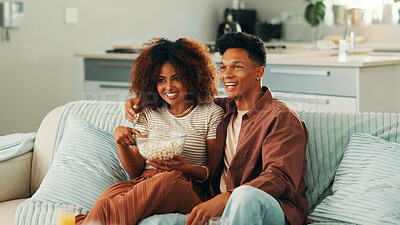 Buy stock photo Popcorn, laughing or happy couple watching tv in home on sofa for funny movies, love or bonding together. House, subscription and man with woman or smile for streaming film, videos or comedy series