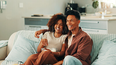 Buy stock photo Popcorn, funny or happy couple watching tv in home on sofa for movies choice, love or bonding together. Laughing, subscription and man with woman or smile for streaming film, videos or comedy series