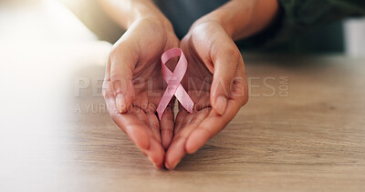 Buy stock photo Pink ribbon, hands and woman for breast cancer awareness, hope and healthcare support. Kindness, survivor and oncology campaign with closeup of person and bow for charity, trust and prevention