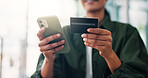 Hands, person or credit card with phone in home for online shopping, digital payment and banking app. Ecommerce, closeup and fintech account on smartphone for website transaction or discount purchase