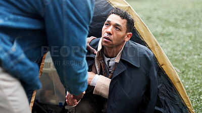 Buy stock photo Homeless, poor and handshake with person for help with donation, compassion and empathy for struggle. Tent, beggar and shaking hands for assistance, blessing and charity with vulnerability outdoor