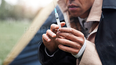 Buy stock photo Hands, poverty and homeless with syringe, drugs and tent with addiction, injection and substance abuse at park. Person, needle and narcotics with grief, bankrupt and outdoor with illegal medicine