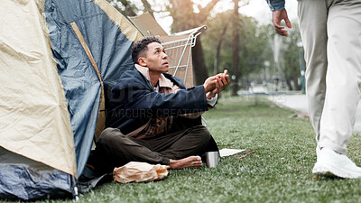 Buy stock photo Homeless man, poverty and begging at park by tent for help, donation or kindness from society. Person, hope and ask for money, change or coins for financial crisis, jobless or bankruptcy on ground