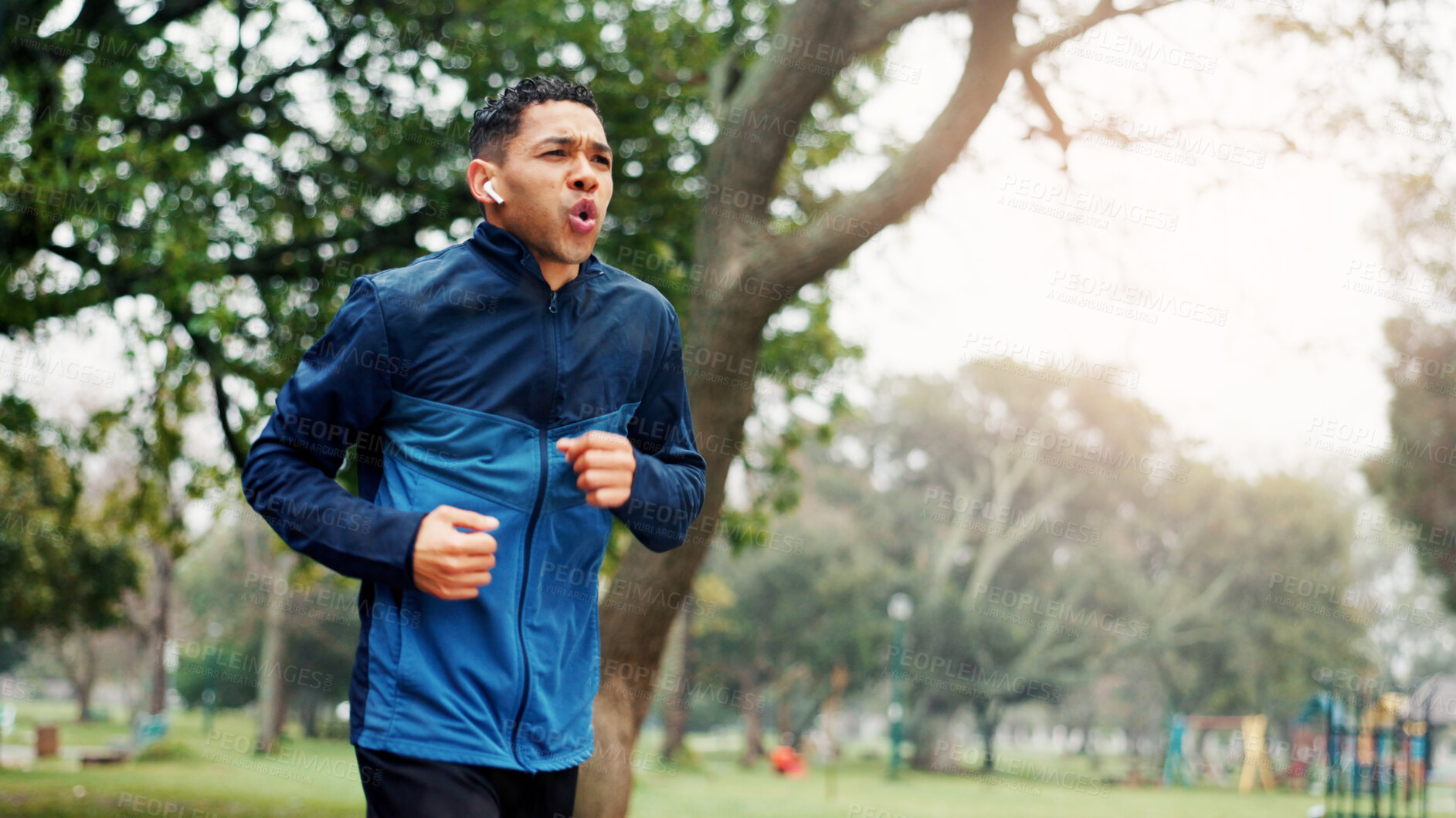 Buy stock photo Nature, fitness and man running in park for race, marathon or challenge training outdoor. Sports, exercise and male athlete with cardio workout for health and wellness in garden for activity. 