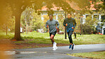 Friends, fitness and men running in road for marathon training, wellness competition or cardio exercise. Flare, teamwork or runner club with physical workout, sports challenge or morning jog at park