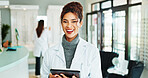 Tablet, woman and portrait of optician in store for vision, eye care or wellness report online. Happy, research and female optometrist with technology for checking ophthalmology appointment in shop.