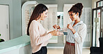 Happy women, optometrist and customer with new glasses for customer service, sight or vision at shop. Female people, store or client buying spectacles with smile or box for eyecare or visual aid