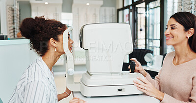 Buy stock photo Eye test, equipment or medical with optometrist and patient in clinic for visual assessment. Autorefractor, exam and healthcare with people in optometry store for prescription frame lenses or vision
