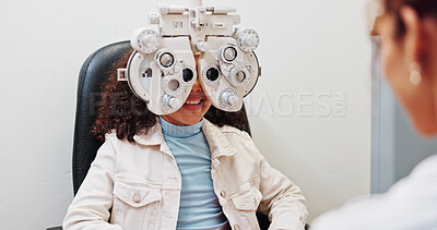 Buy stock photo Eye test, optometry and optician with kid in clinic with phoropter for prescription lens. Ophthalmology, wellness and optometrist with girl child for vision assessment with machine in store.