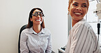Eye care, smile or optometry with woman in clinic with diagnostic tool for prescription lens. Happy client, glasses or optometrist in vision assessment with trial, eyesight correction and support
