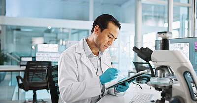 Buy stock photo Scientist, man and tablet with microscope for biology, breakthrough or medical research analysis. Biotech, laboratory and thinking with DNA study for pharmaceutical RNA or pathology experiment