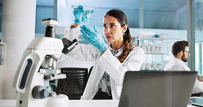 Buy stock photo Scientist, woman and chemical with laptop for liquid, breakthrough or medical notes analysis. Biotech, laboratory and microscope with DNA for pharmaceutical RNA study or chemistry experiment project
