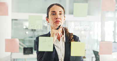 Buy stock photo Business, glass wall and woman with creativity, thinking and planning with ideas for proposal. Mature person, decision and sales consultant in workplace, problem solving and brainstorming for project