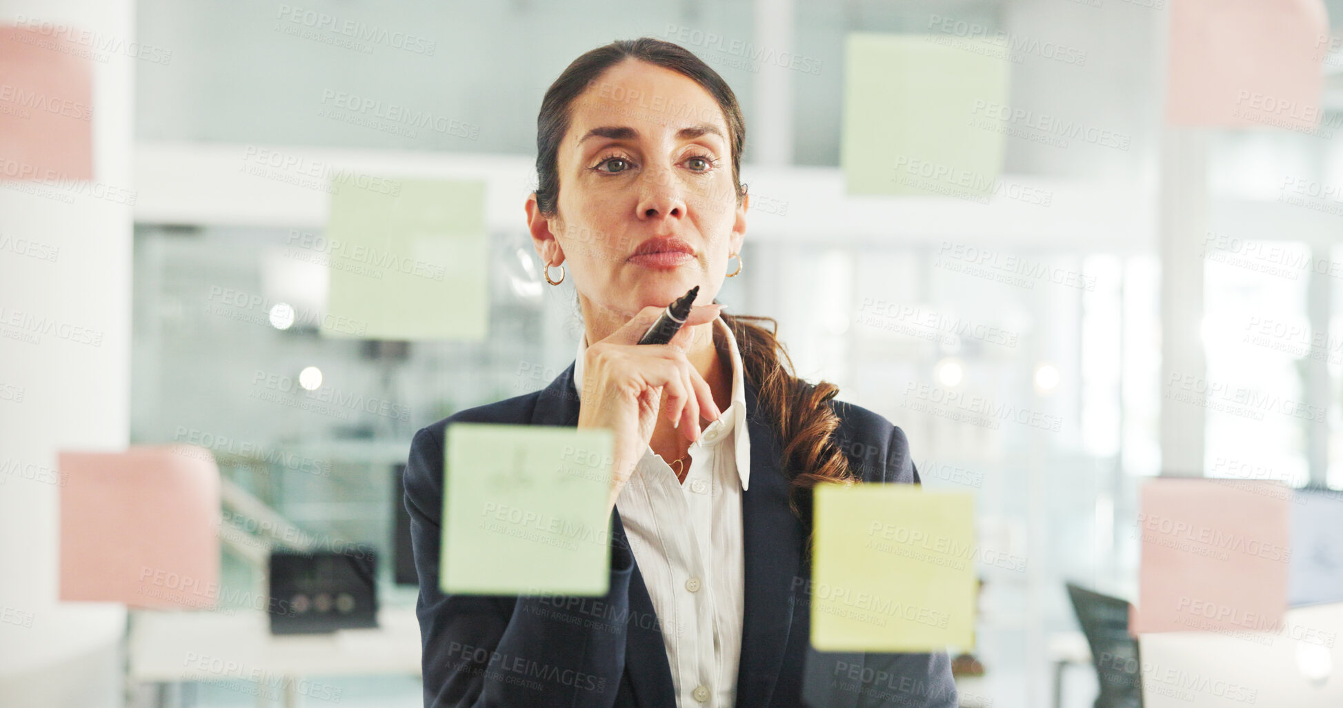 Buy stock photo Business, glass wall and woman with creativity, thinking and planning with ideas for proposal. Mature person, decision and sales consultant in workplace, problem solving and brainstorming for project