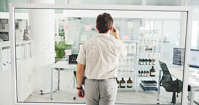 Buy stock photo Business, glass wall and man with back, writing and planning with ideas for project. Person, employee and consultant in workplace, problem solving and brainstorming with choice, research and decision