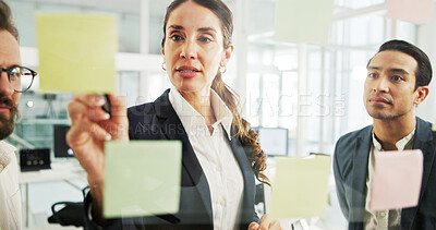 Buy stock photo Discussion, writing and woman with sticky notes, colleagues and planning for financial growth and company. Banker, ideas and info for potential investment, mature person and collaboration in business