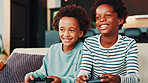 Video games, happy and children on sofa in home for competition, winning and playing online in living room. Gaming, family and kids on couch with controller for fun, entertainment and relaxing