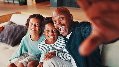 Buy stock photo Selfie, portrait and dad with children on sofa for social media, profile picture or online post in home. African family, silly and father with kids take photo for bonding, fun and funny face together