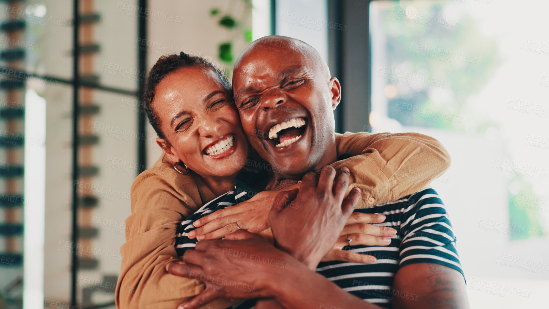 Buy stock photo Happy couple, hug or portrait with laugh for love, care or affection together at home. Face, man and woman with smile, positive commitment or comfort for embrace, holiday weekend or marriage at house