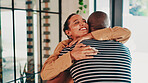 Hug, smile and couple with key, new house and celebration for mortgage, moving in and love in lounge. Real estate, embrace and people with success of home loan, happiness and excited for investment