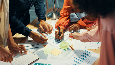 Buy stock photo Hands, graphs and group of business people planning strategy, performance analysis and writing on paper. Charts, documents and collaboration with financial stats, revenue and profit in office above
