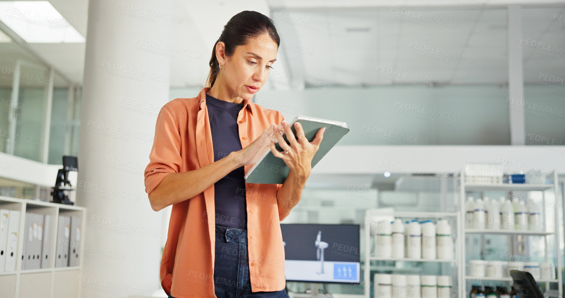 Buy stock photo Tablet, typing and business woman in office for Sustainability advisor, carbon footprint policy and research. Windmill design, environment report and review with person in  agency for project manager