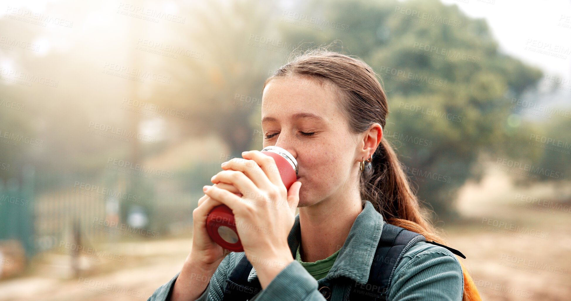 Buy stock photo Break, drinking water and woman with hiker outdoor in nature for adventure, hobby or journey. Bottle, hydration and vacation with thirsty person hiking in park for morning exploration or health