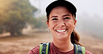 Smile, hiking and portrait of woman in nature for adventure, exploring or discovery on holiday. Excited, confident and female person from Australia on trekking and backpacking trip outdoor in forest.