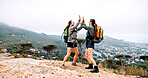 Women, hiking and high five on mountain, celebration and achievement at summit with goals in nature. People, girl and friends with cheers, happy and trail with view, success and adventure in Italy