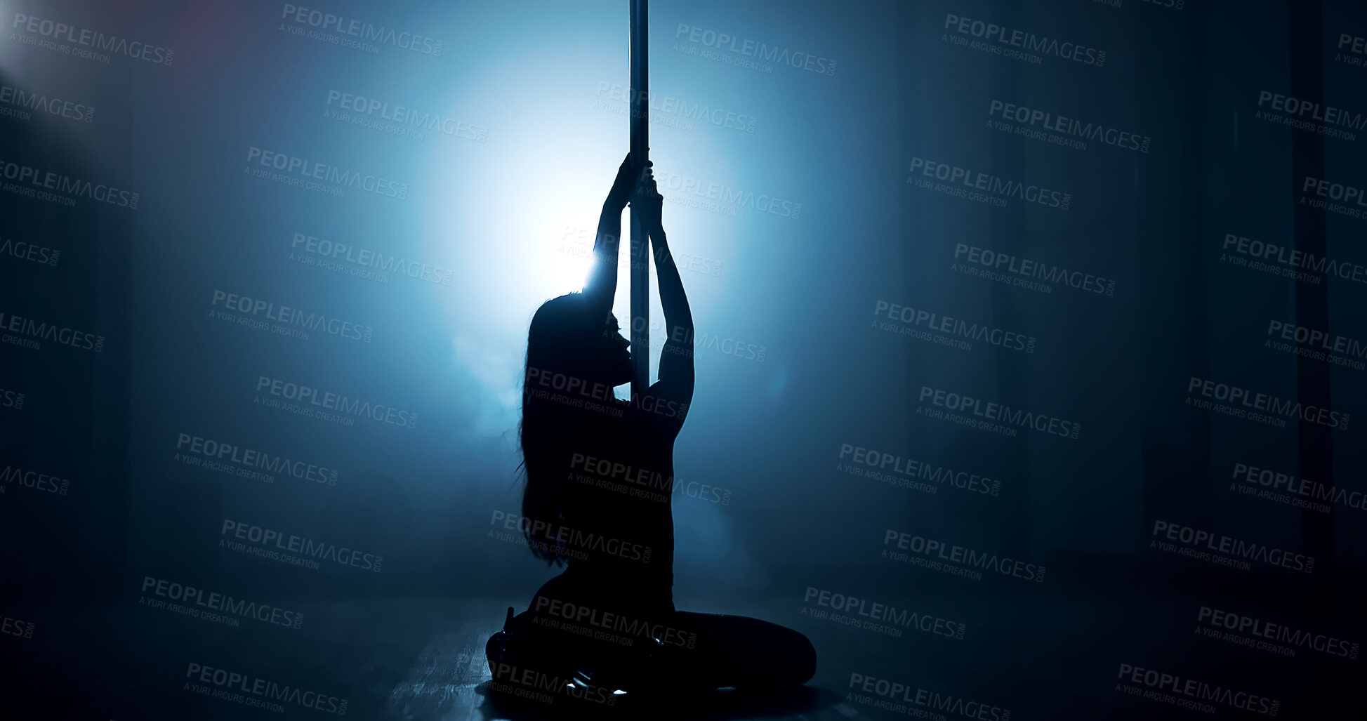 Buy stock photo Woman, dancing or pole with spotlight for silhouette, tease performance or sexy movement in nightclub. Person, dark background or girl in stage routine for seduction, strip or party entertainment