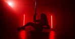Woman, night or dancer with pole for party, tease performance or sexy movement in club. Silhouette, spotlight and female person in practice routine for seduction, stripping and stage entertainment