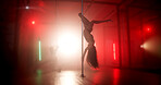 Woman, dancer and pole with lights for music, tease performance and sexy movement in nightclub. Person, stage or girl in upside down routine for agility, seductive dancing and party entertainment