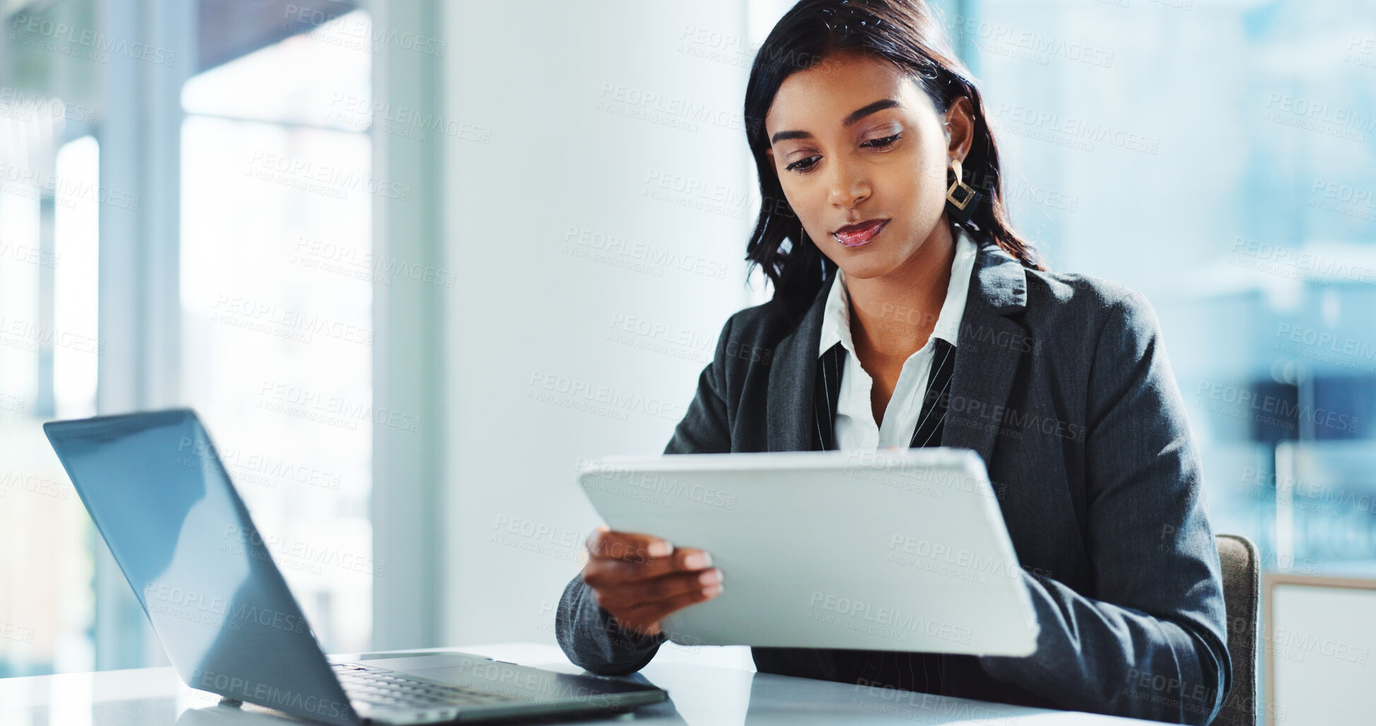 Buy stock photo Office, tablet and business woman online for insurance, risk management or policy sales on internet. Technology, laptop and employee reading email for financial coverage, review claims and research