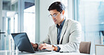 Internet, typing and business man on laptop for insurance, risk management or policy sales. Technology, serious employee and reading email for financial coverage, review claims or research in office