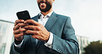 Businessman, hands and trading with phone in city for finance app, stock or online investment. Closeup, happy man or trader with smile on mobile smartphone for network, connection or tax return