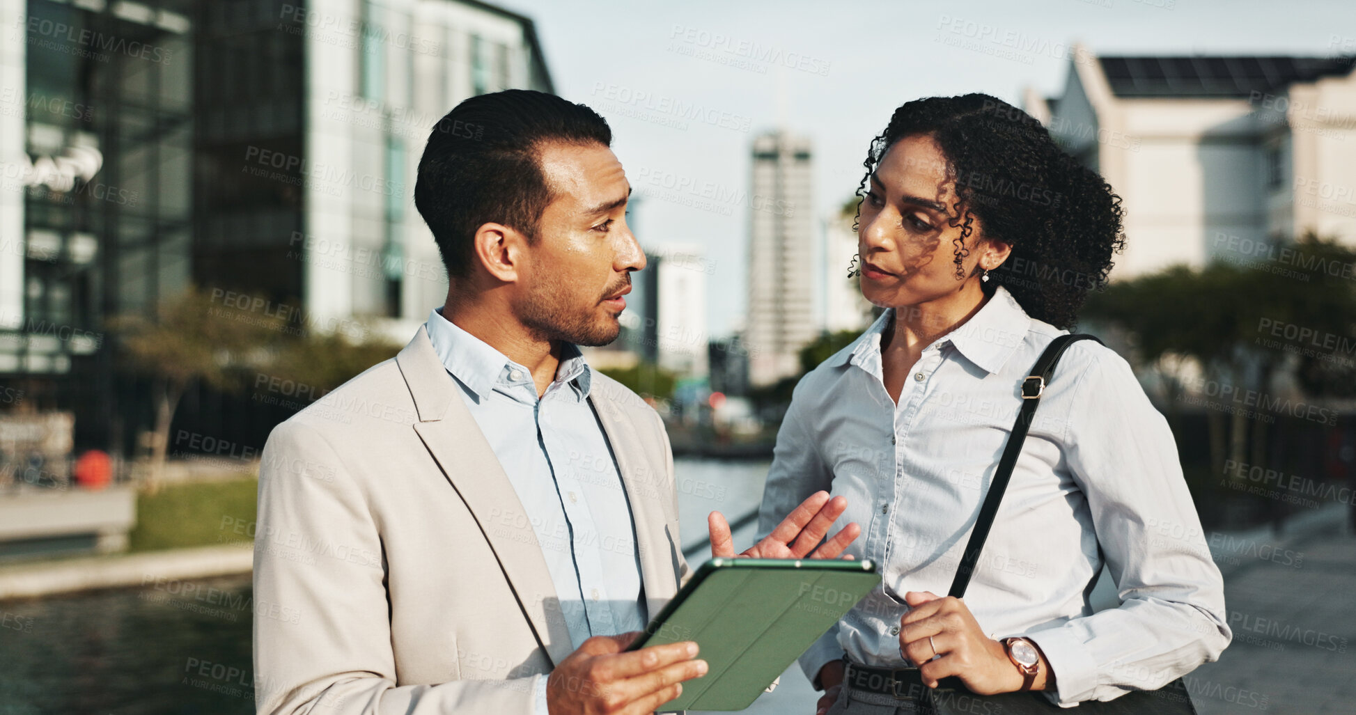 Buy stock photo Corporate, people and explaining with tablet in city for planning, engineer team and urban development. Man, woman or talking with digital information, project management and infrastructure expansion