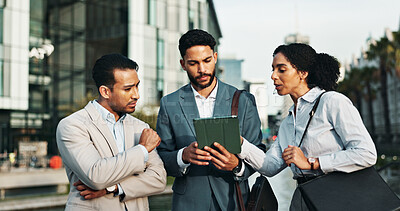 Buy stock photo Tablet, talking and business people in city for meeting, teamwork and collaboration on urban development. Professional, men and woman on digital tech for research, town planning and discussion