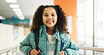 Happy girl, portrait and student with backpack at elementary school for growth, education or learning. Face, child or kid with smile, bag or knowledge for academic future or childhood development