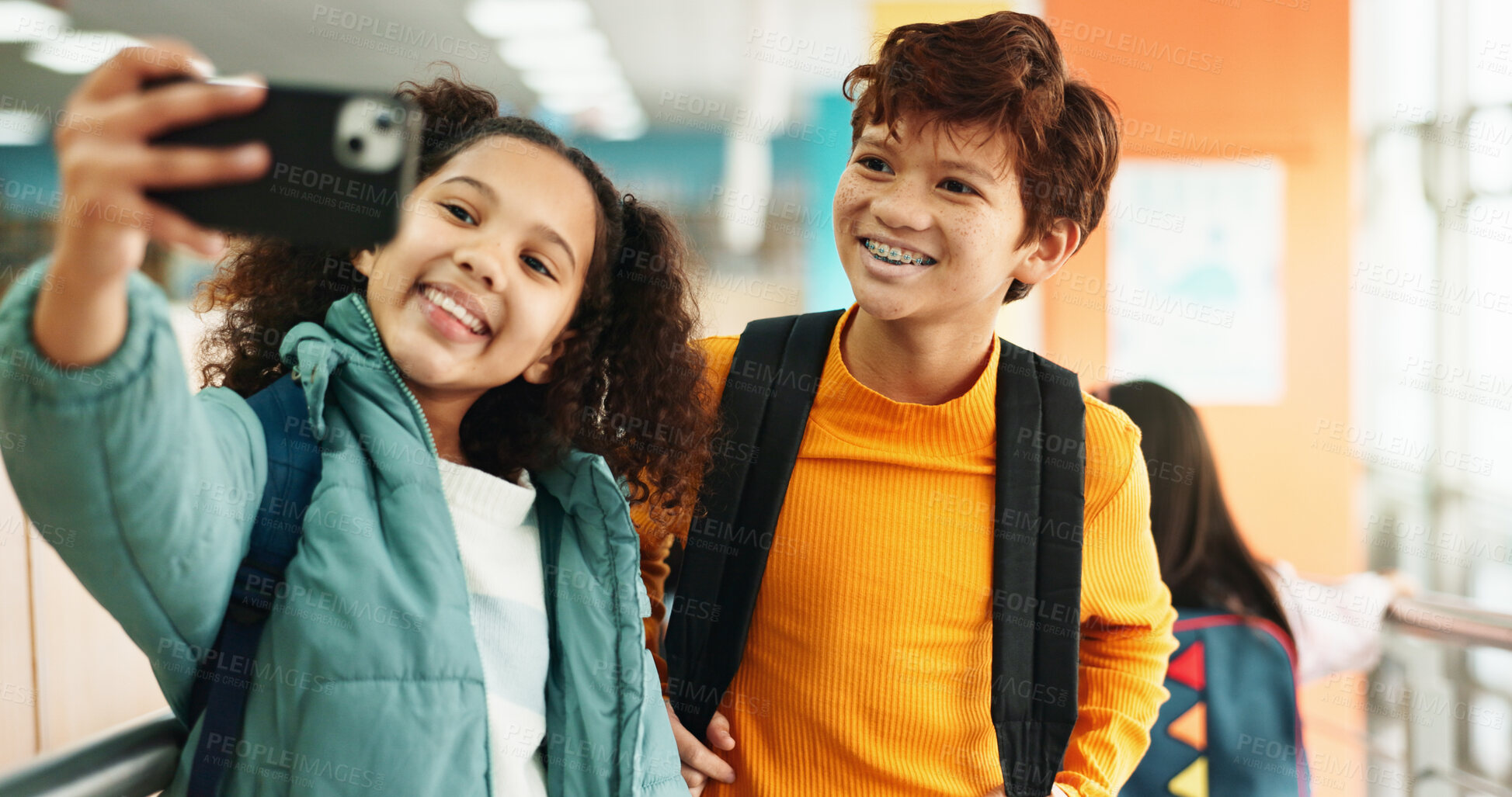 Buy stock photo School, hallway and selfie of kids with backpack and smile for studying, classroom and learning. Students, campus and children with picture for social media and education, friendship and knowledge