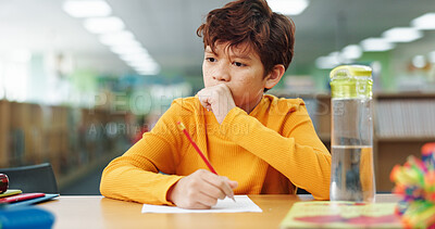 Buy stock photo Boy, education and writing with thinking at library for test, study or development with problem solving. Child, notes and solution with learning, assessment or school project with scholarship in hall