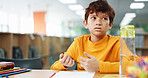 Boy, counting and thinking with learning at library with math, study or problem solving for development. Kid, notes and solution with education, assessment or school project with scholarship in hall