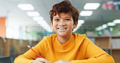 Buy stock photo Boy, smile and child with learning at library with math, study or problem solving for development. Kid, happy and portrait with education, assessment or school project with scholarship in Mexico