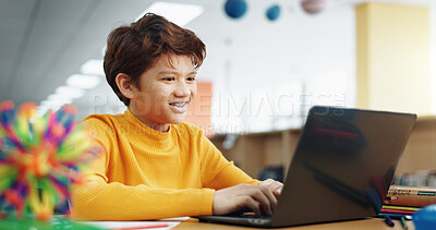 Buy stock photo Student, library and child on laptop for e learning, remote education and online class with knowledge. Virtual school, development and happy pupil typing on technology for growth on teaching platform