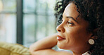 Thinking, smile and woman relaxing in home on weekend with memory, self reflection or daydreaming. Happy, calm and female person with decision, choice or peaceful morning on sofa in apartment.