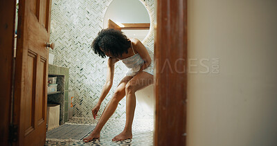 Buy stock photo Woman, legs and bathroom with razor blade for epilation, hair removal or skincare at home. Female person, shave and dermatology with tool or treatment for depilation, skin routine or hygiene at house