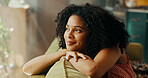 Happy woman, thinking and relax with sofa for dream, holiday or weekend break at home. Female person, thoughtful or wonder with smile in comfort for rest, memory or peaceful moments on couch at house