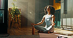 Meditation, yoga and zen with woman on floor of home for balance, inner peace or mindfulness. Chakra, mudra and pilates with yogi person in apartment for awareness, health or wellness routine