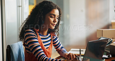 Buy stock photo Online shop, woman and reading laptop at small business for inventory management and stock procurement. Ecommerce, startup owner and technology for shipping info, website review and tracking delivery