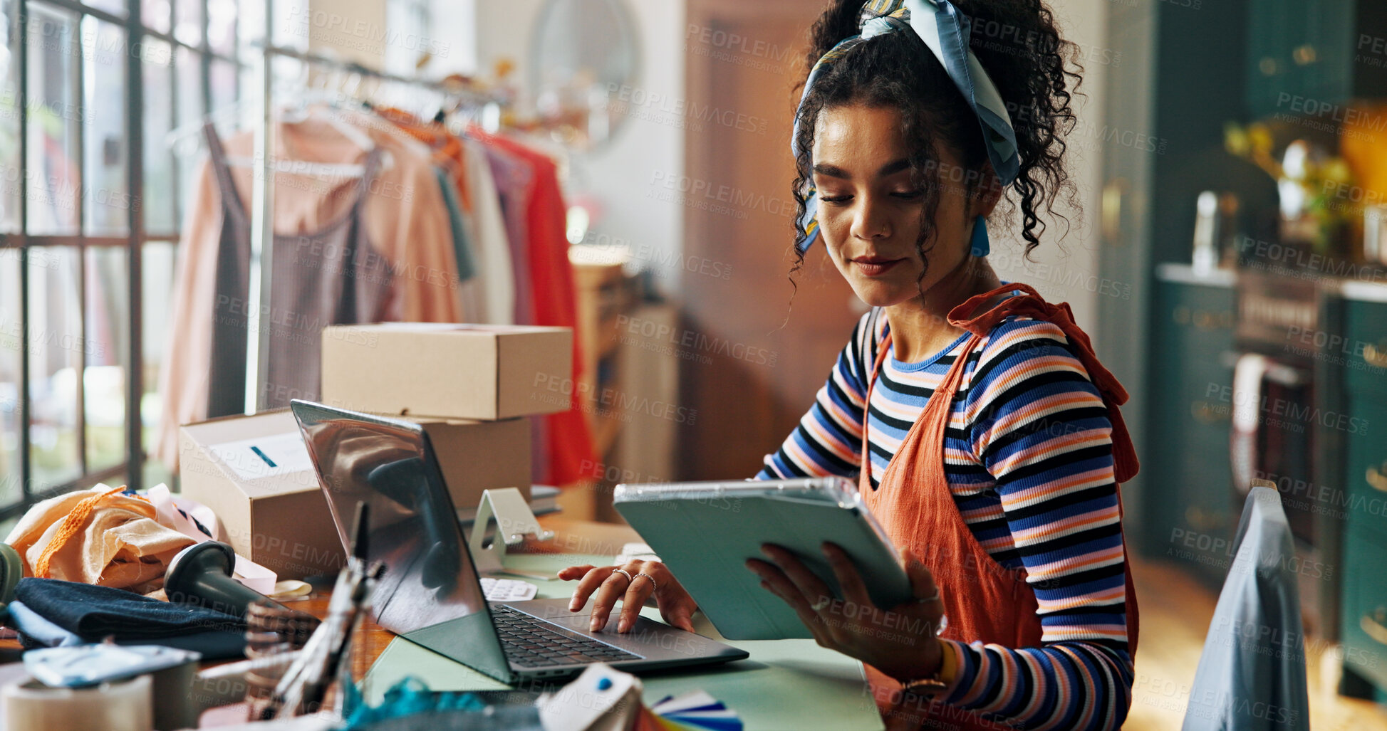 Buy stock photo Woman, tablet and typing on laptop of small business for stock check, planning logistics and checklist. Person, digital and review sale with online orders, inventory management and schedule delivery